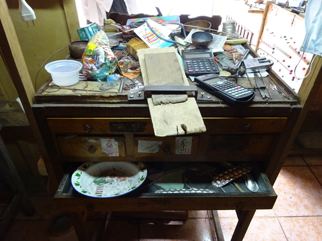 One of Marco's workbenches...cluttered like so many an artist!