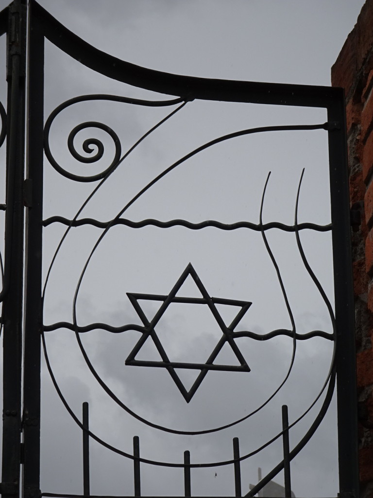 The Catholic cemetary here is HUGE (and a bit creepy), but we liked seeing the small Jewish area of about 12 graves. Here's the gate to get in...