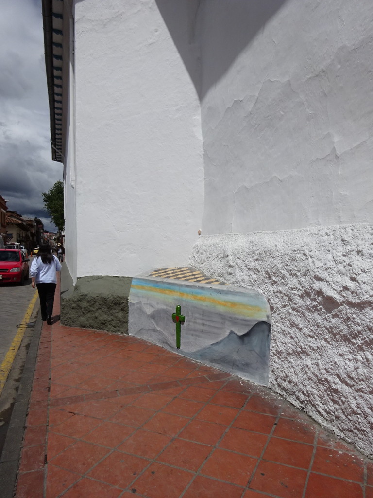 Know what this is? The churches around town build these triangles into the street corners of the church and paint them to deter people from peeing right there. 