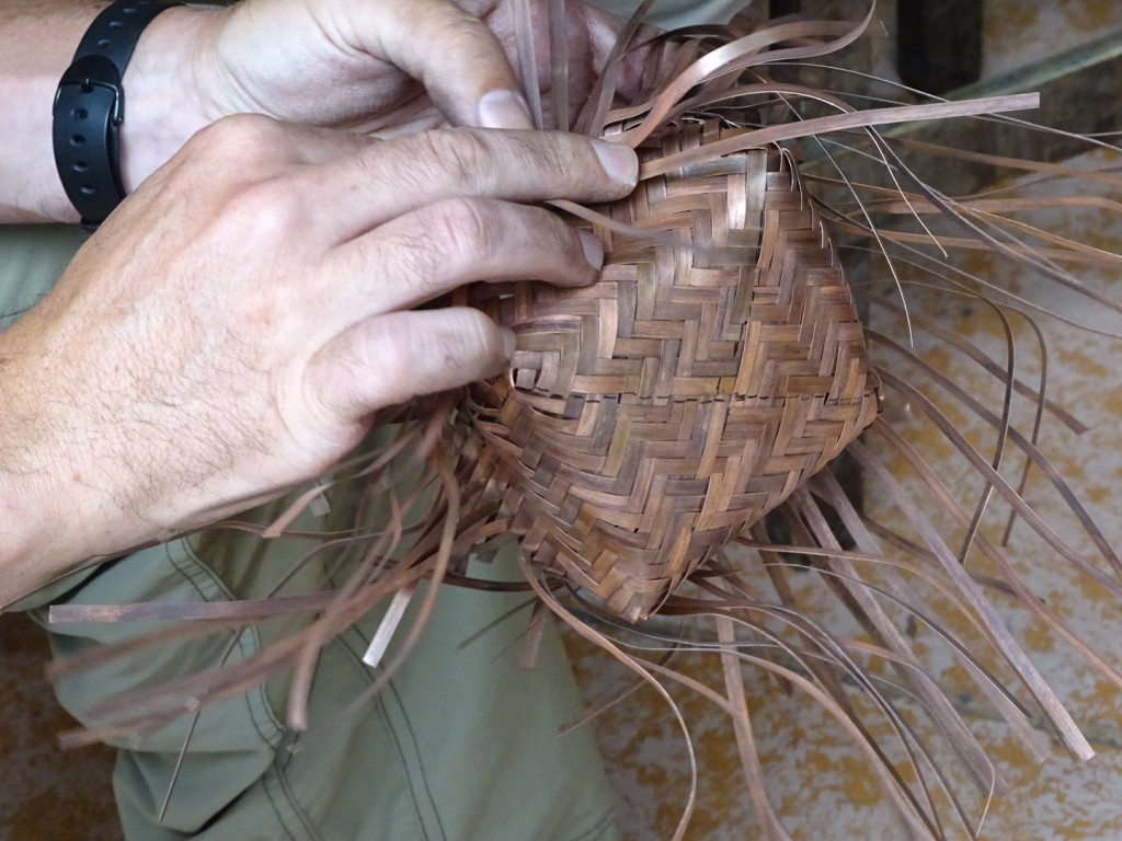 Bend up the sides and keep on weaving! You can see the black marks on the bottom which I had originally made as center-lines. You can also see the spaghetti that had me often confused as I tried to follow the pattern!