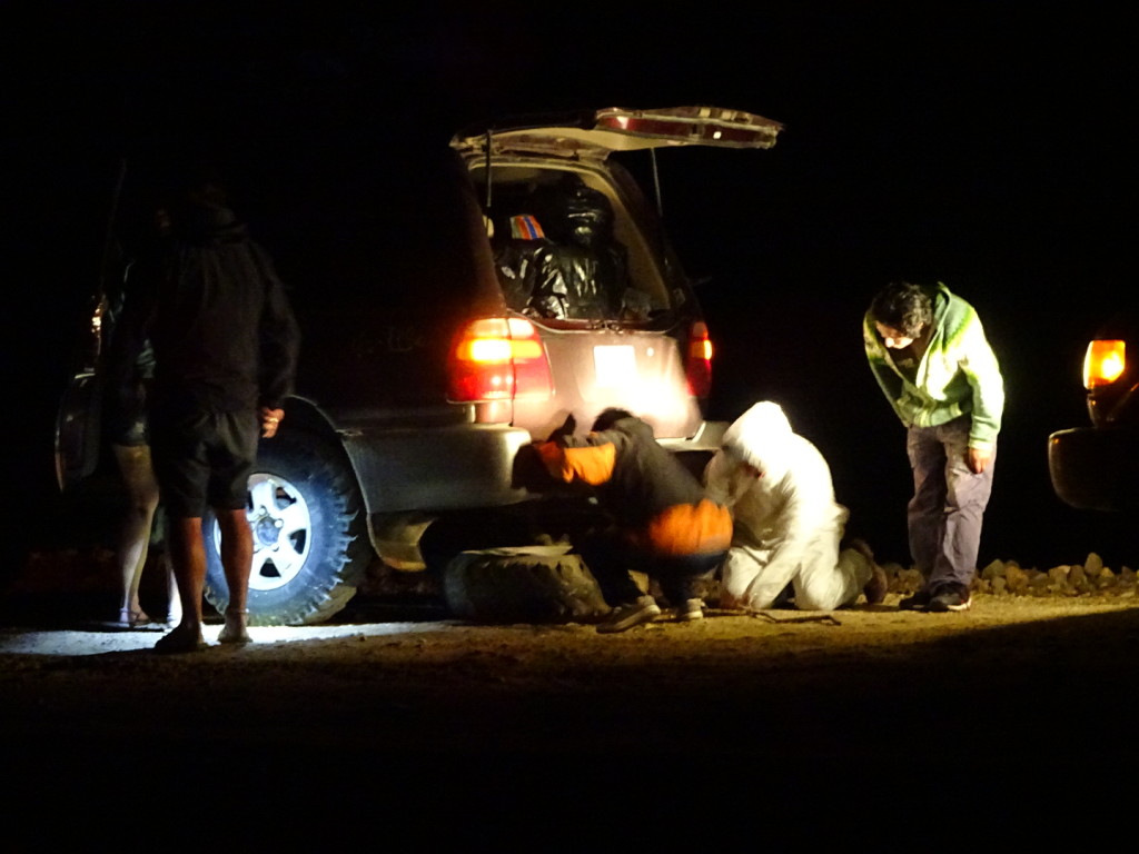 A quick change of the suspension. It took them about 15 minutes to fix the car. We watched the stars while the drivers did the hardwork. 