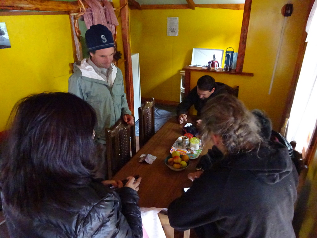 Our cabin the first night - everyone huddled around trying to figure out who owes what amount in three different currencies and two difference languages. 