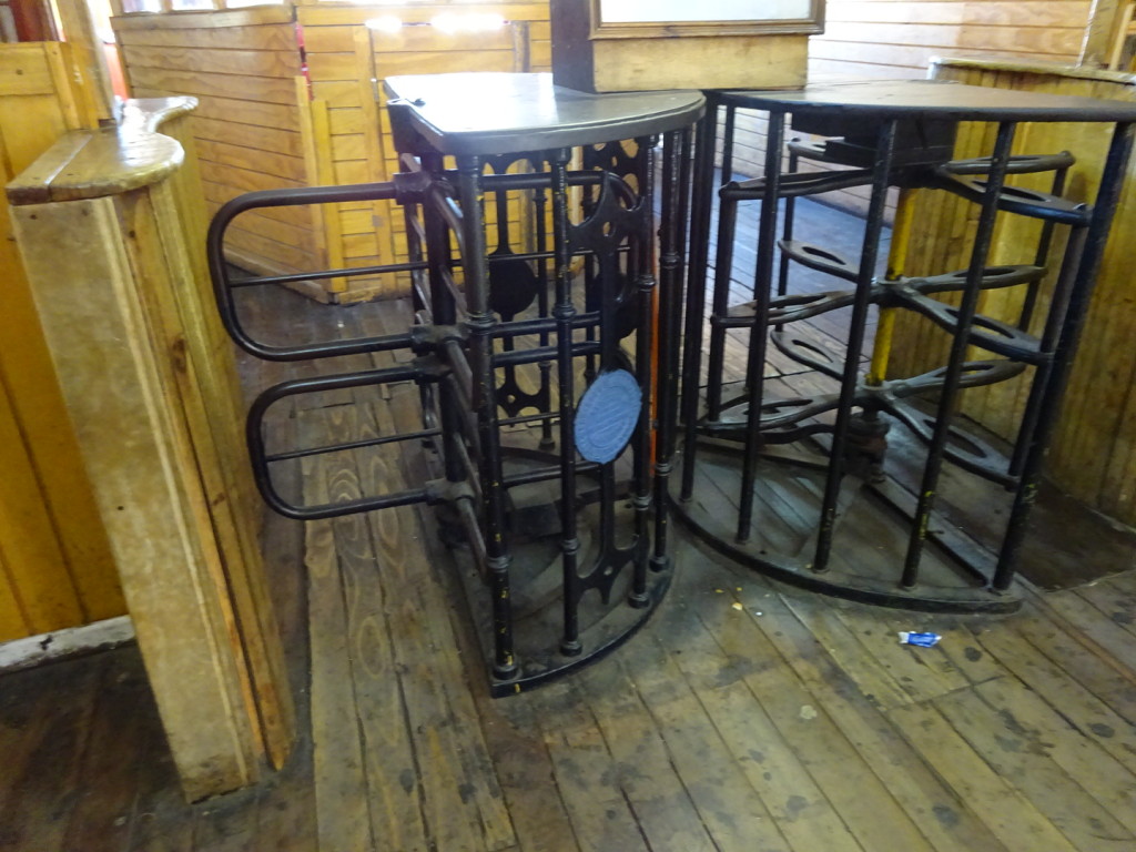 Wonderful old turnstiles, still letting riders on and off smoothly as they did in 1916.