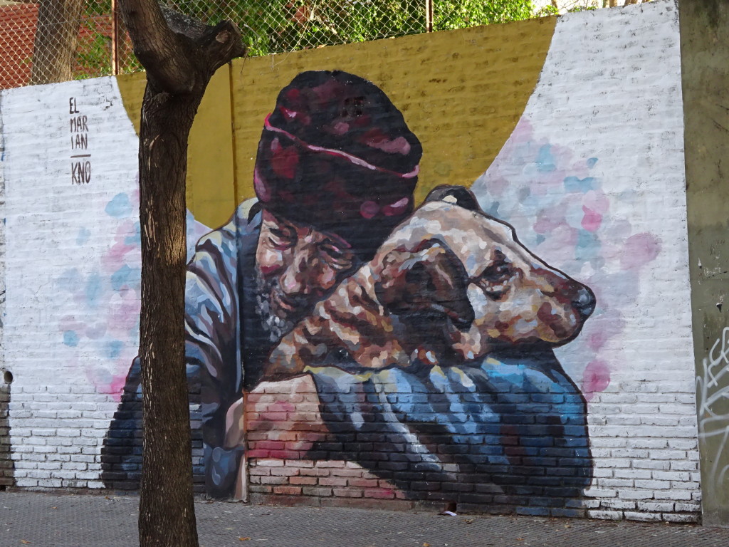 On a school wall between the school and a homeless shelter...the school asked for a painting giving kids a feeling of safety and belonging.