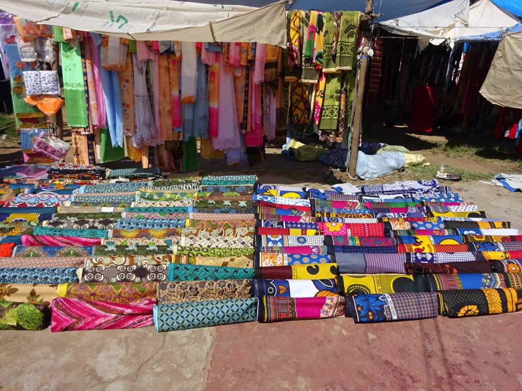 How to pick? There were about 10 sections of fabrics laid out like this - most with different sellers.