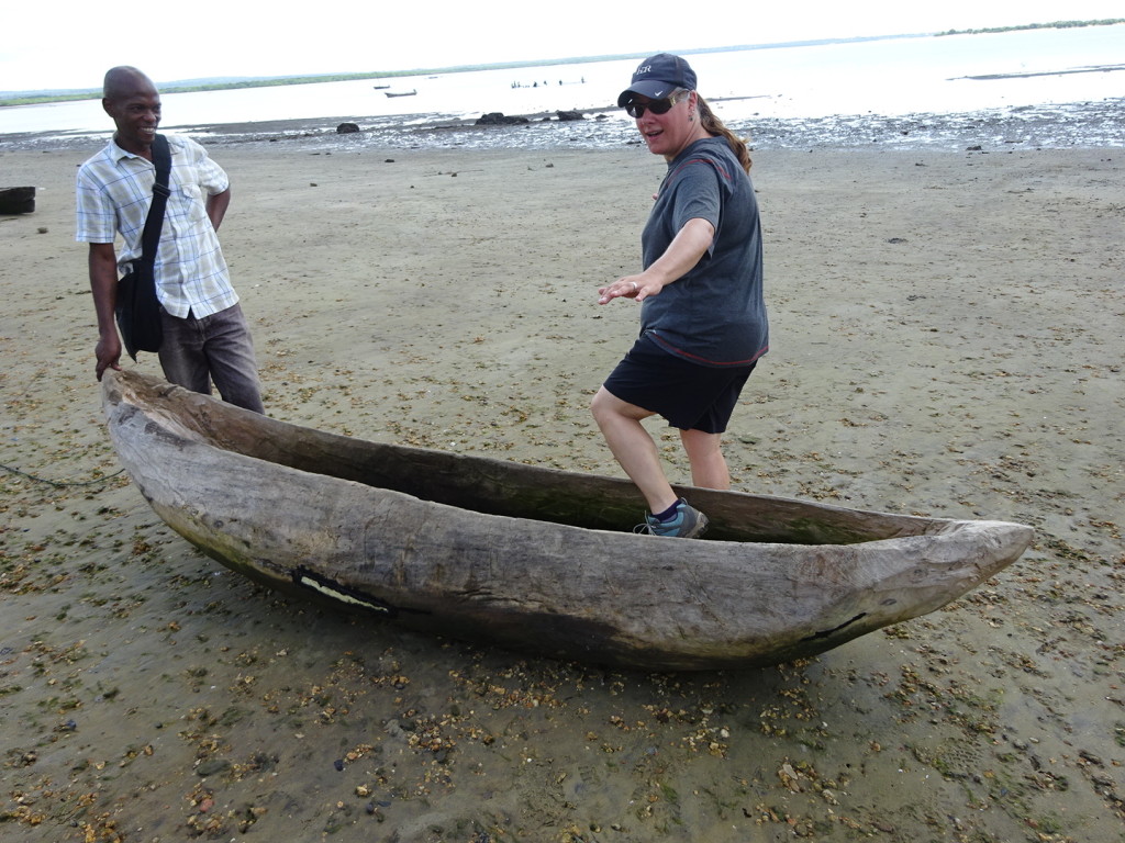 Yes, it's a hand-made hallowed out wood canoe, but what's so great is David's expression. He's watching me like a hawk because 5 seconds earlier I nearly fall over possibly breaking somebody's canoe speak nothing of my own body. He's always a polite and professional guide and is clearly just sort of putting up with Aaron and I and our need to document even the most rudimentary things.