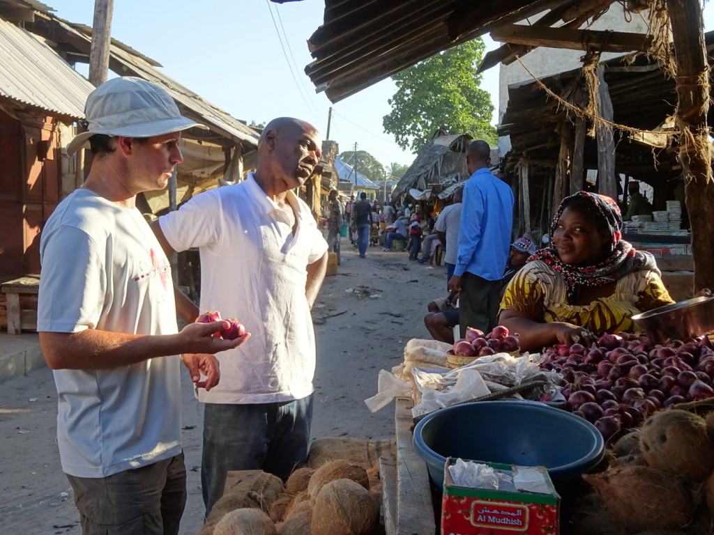 Negotiation for a couple of onions is not going well! Check out hte expressions on everyone's faces.  (I love this shot!)