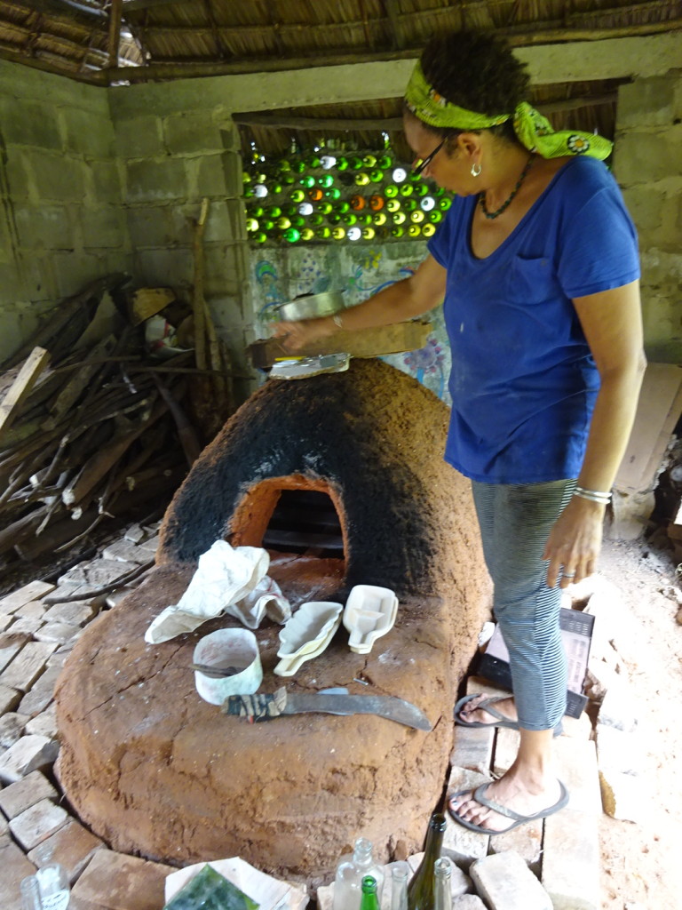 NAME showing us the kiln where we melted and twisted some bottles. And by "we" I really mean, Aaron.