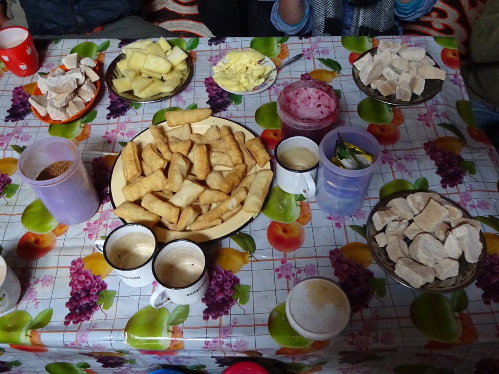 Fried dough in the middle, dried yogurt in the corners and yak milk cheese 2nd from the top left - breakfast of kings! Well, plus porridge.