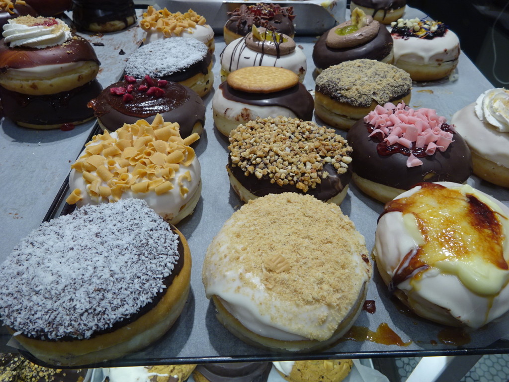 These are raised donuts, cut in half and filled like a sandwhich and then topped. Insane!