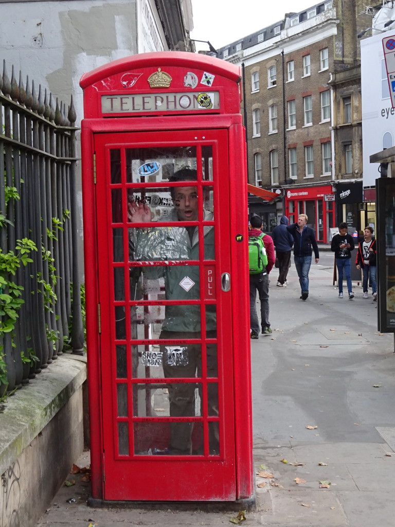 Right after Gideon told us the classic red phone booths were mostly used by prostitutes for advertising (check for their cards above the phones!), Aaron jumped right in.