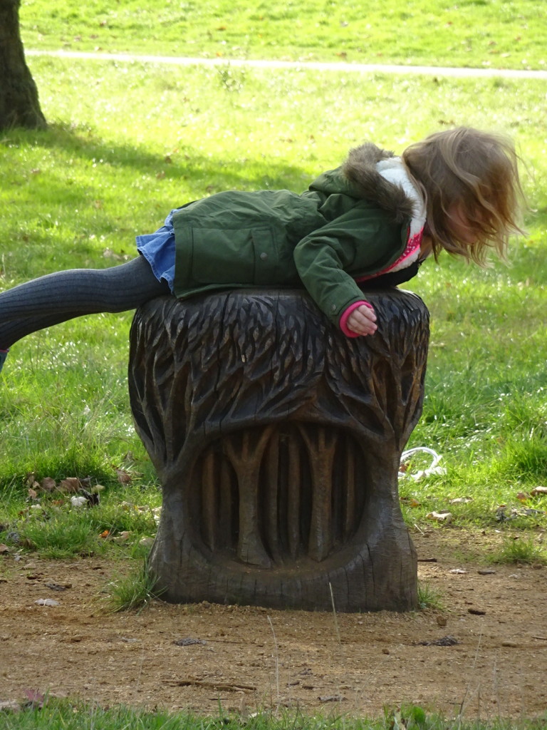 Fun sculpture tables and stools at the park on a sunny fall day (I think it was Regent's, but it might have been Primrose Hill). Doesn't get any better and this youngster knew it.