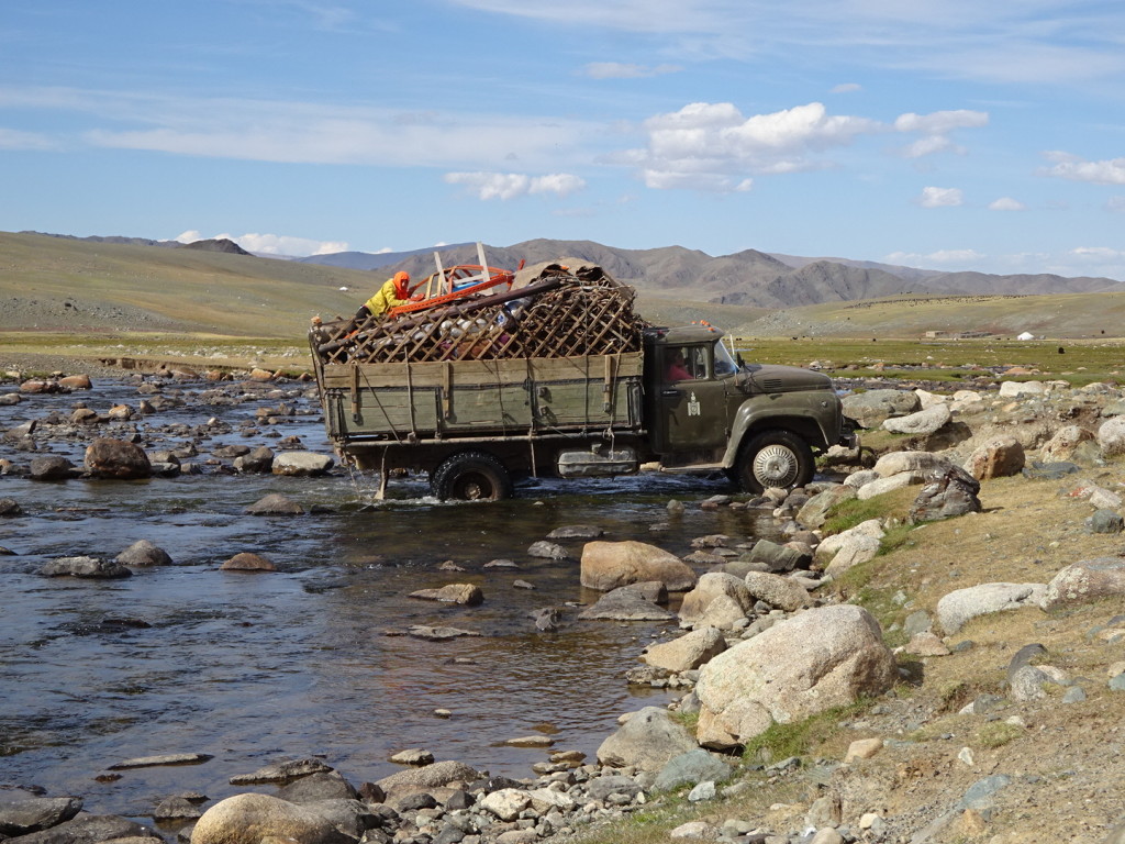 Love, love, love this pic - moving day in Mongolia. Khazaks move about every three months. Alti Mountains, Mongolia.