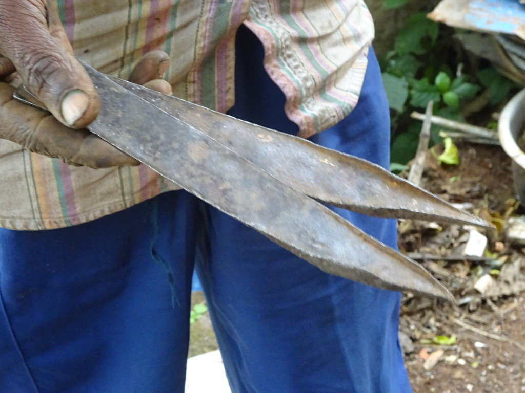 Dividers made from two pieces of recycled metal with hand-rolled edges (by hammering against an old section of railroad tie).