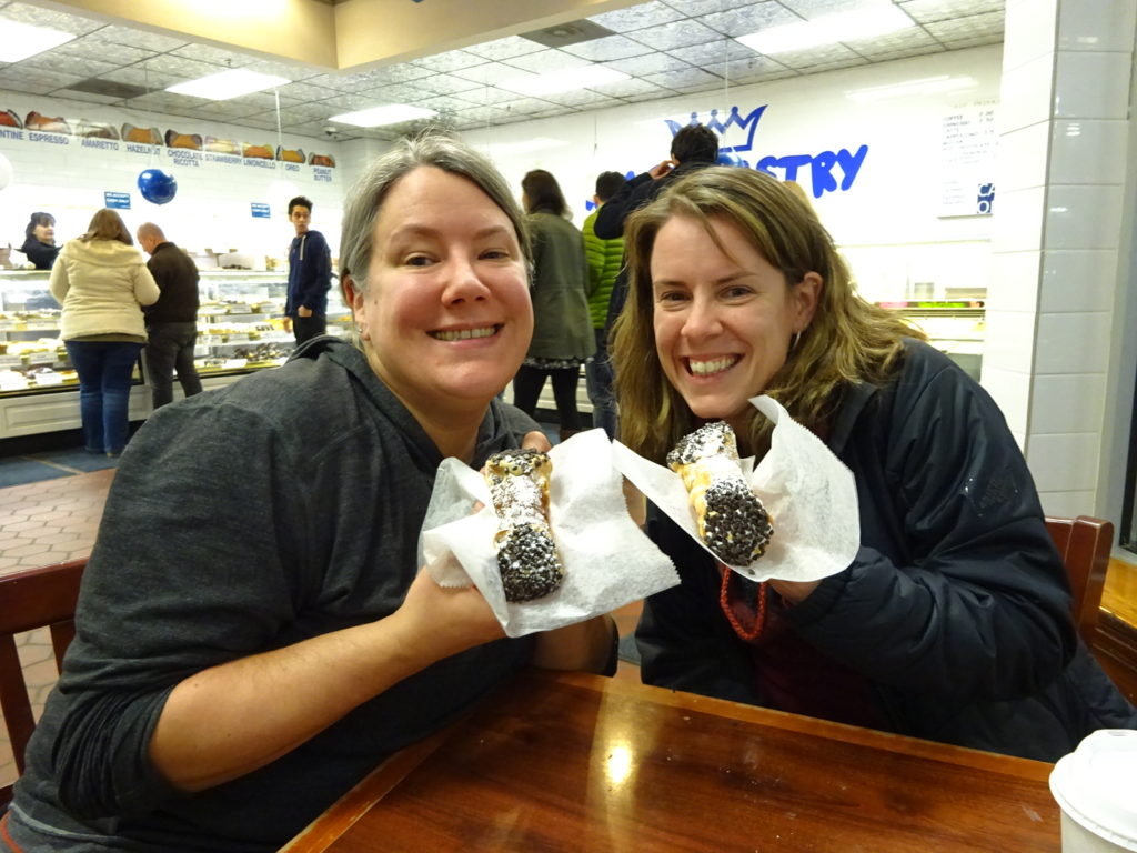 Cari and me enjoy a canoli in little Italy. I've never had canoli before!