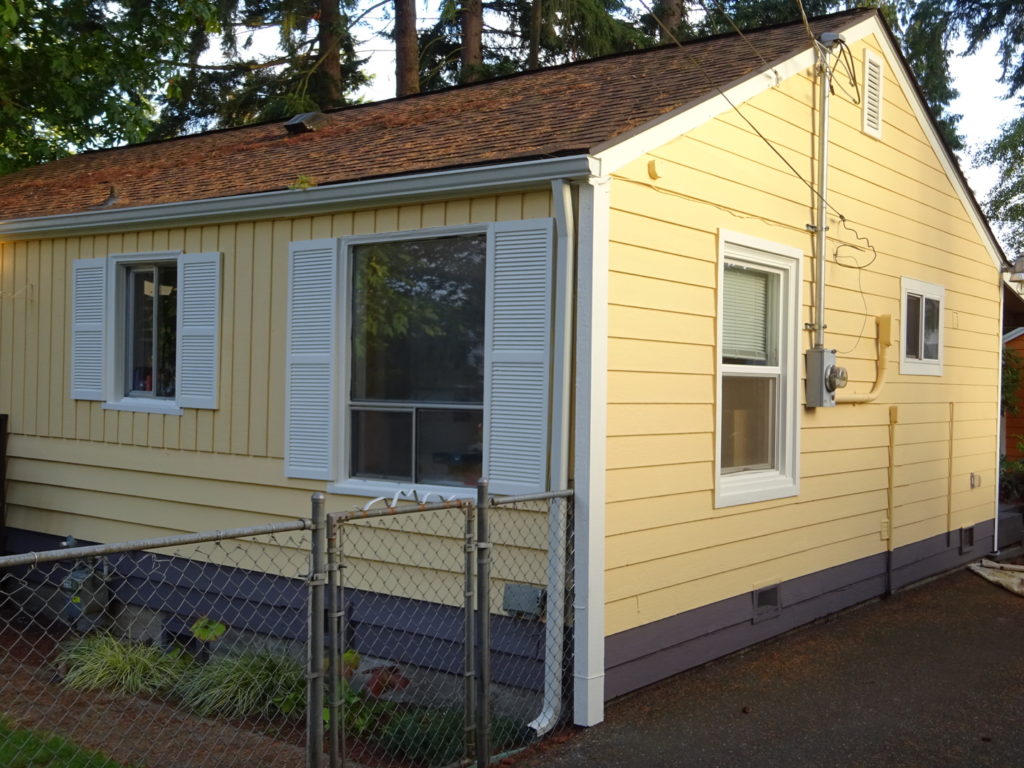 Warm yellow on top with a lower band of rich purplish-brown.