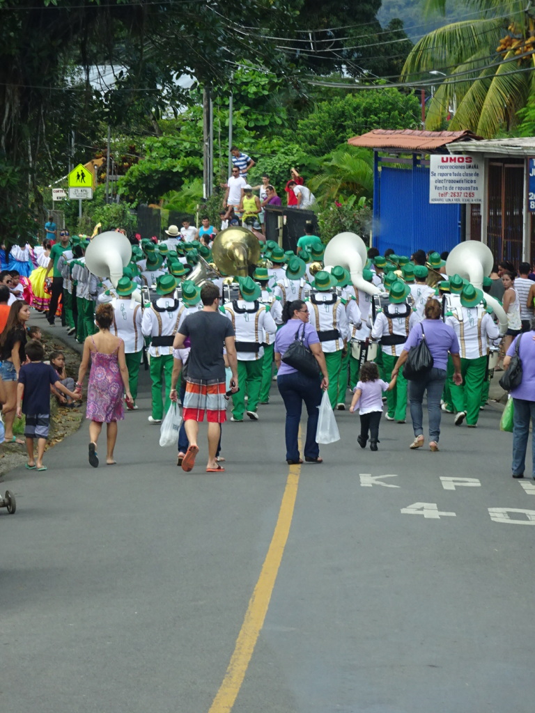 The bus turned down a little road and there was a parade in full swing! We had to back up and take a different way.