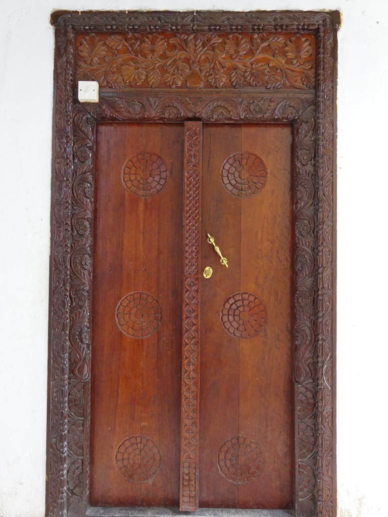 Some doors had the door itself and handle modernized, but kept the original carved frames.